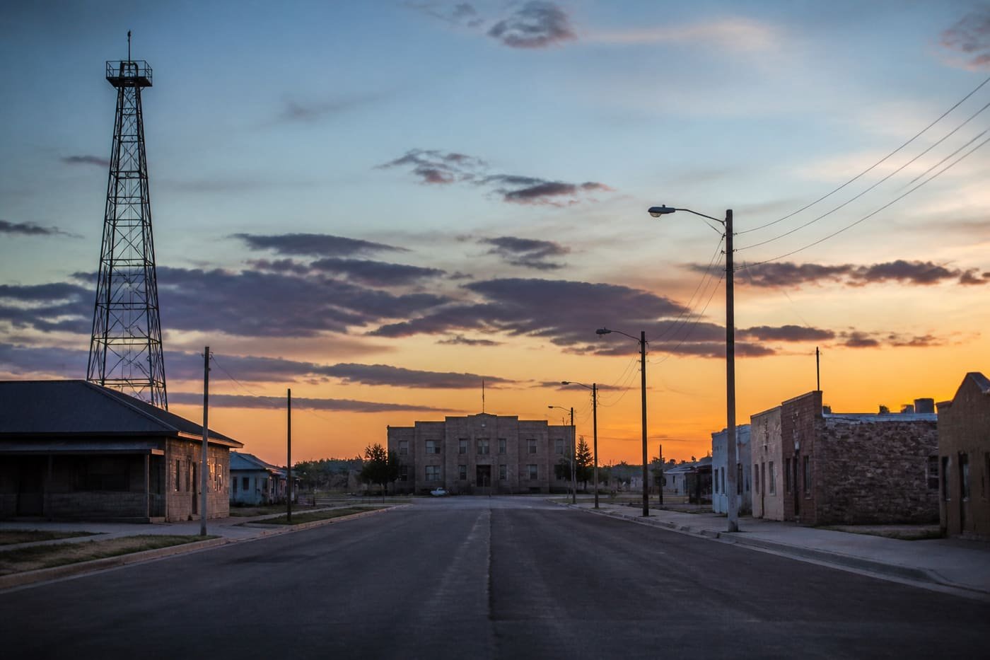 Wide prairie street in a Wyoming town at dusk